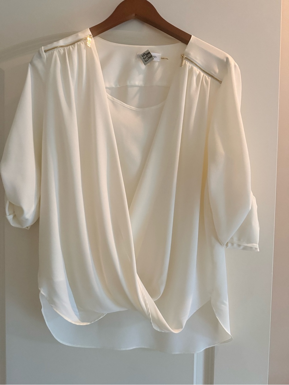 Calvin Klein Cream Draped V-Neck Blouse with Gold Accent